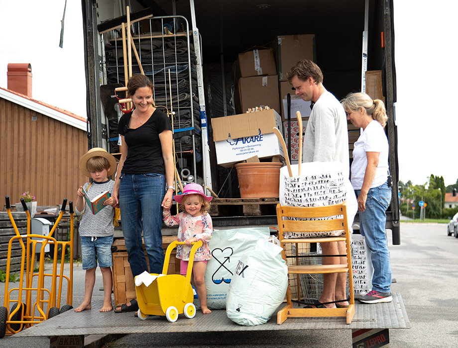 Family behind a truck